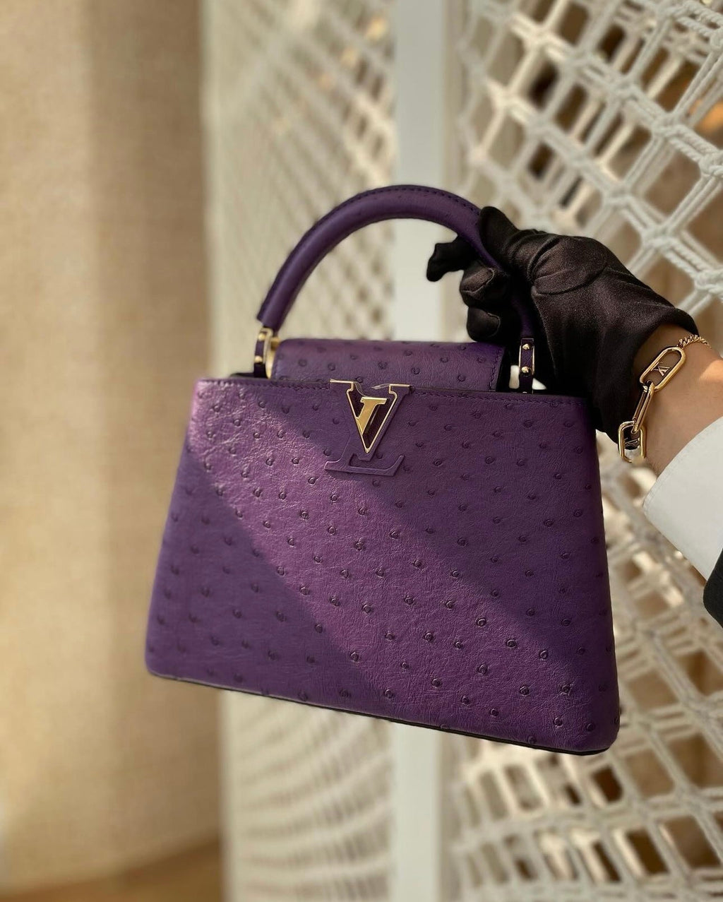 The stunning Louis Vuitton Mini Capucines in purple ostrich (Limited Stock)