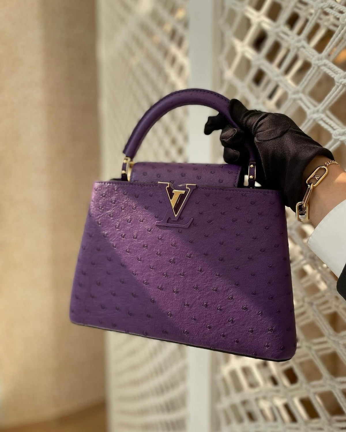 The stunning Louis Vuitton Mini Capucines in purple ostrich (Limited Stock)