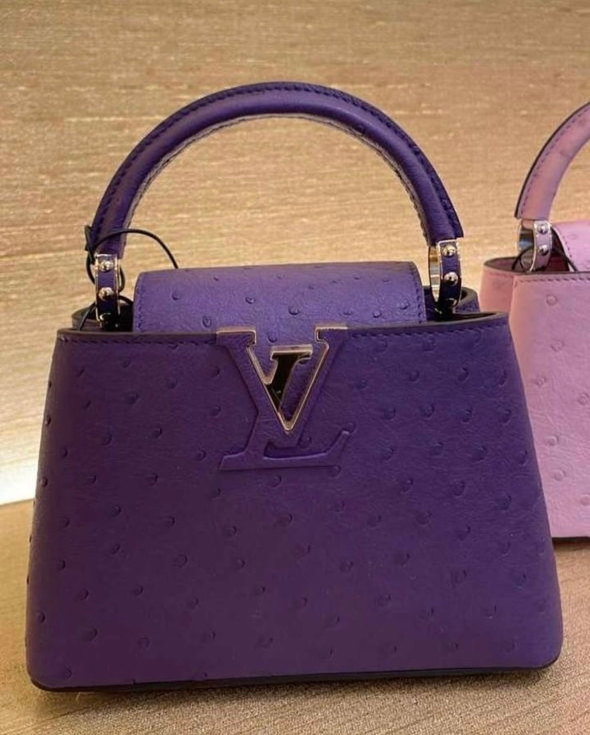 The stunning Louis Vuitton Mini Capucines in purple ostrich (Limited Stock)